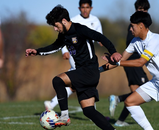 Wauconda's Sam Jurczyk (10) works the ball as time winds down. Wauconda defeated Grayslake North 2-1 kin the Class 2A Woodstock North Regional championship at Woodstock North High School, Saturday Oct. 26, 2024. (Rob Dicker / for the News-Sun)