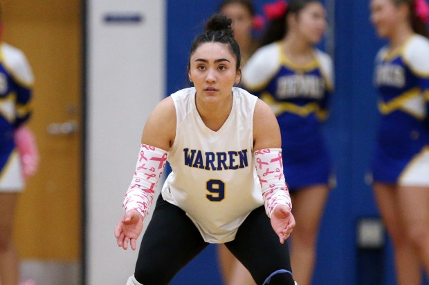 Warren's Taylor Coombes (9), waiting for the serve, during the game on Thursday, Oct. 3, 2024, in Gurnee. (Mark Ukena for the Lake County News-Sun)