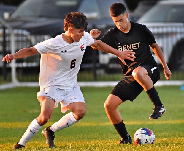 Benet's Sergio Polanco does some fancy footwork as Plainfield East's Niko Bahena (6) defends during a game Monday, Sept. 30, 2024 in Lisle...(Jon Cunningham/for The Naperville Sun)