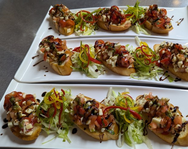 TEMPTINN, a new restaurant serving Indian fusion cuisine, is opening in downtown Naperville at 220 S. Washington St. later this fall. The upscale casual restaurant's menu will include items such as tamarind-tomato bruschetta, pictured here. (Sujay Karvekar)