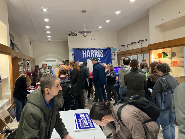 Volunteers gather Saturday, Oct. 26, at Democratic headquarters in Battle Creek, Michigan, before deploying around the city to knock on doors in a get out the vote effort. (Bob Skolnik/Pioneer Press)