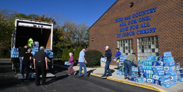 Volunteers outside of the St. Francis de Sales Parish Center in Lake Zurich on Oct. 19, 2024. (Karie Angell Luc/Pioneer Press)