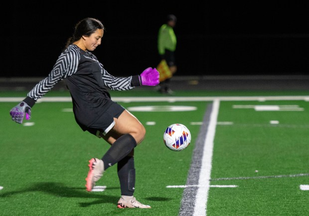 Wheeler's Ashlynne Trinidad kicks the ball during the Class 1A regional semifinal against Boone Grove at Wheeler on Wednesday, Oct. 16, 2024. (Michael Gard/for the Post-Tribune)