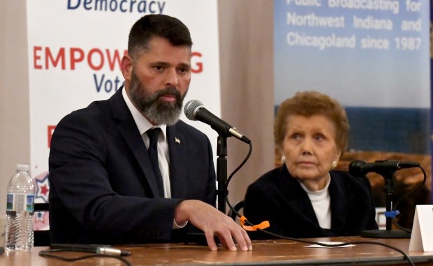 Incumbent Sylvia Graham looks on as candidate Bob DeRunts speaks during a forum for five at-large candidates for Porter County Council at Woodland Park in Portage, Indiana on Monday Oct. 7, 2024. The event was sponsored by the League of Women Voters of Porter County and Lakeshore Public Media. (Andy Lavalley for the Post-Tribune)