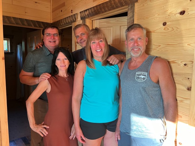 Columnist Phil Potempa, left, reunited with Tom Richardson, far back, and his wife Cathy, forefront, along with Phil's older siblings Pam and David for a stay in the new Ishnala Cabin 3 at Richardson's Shangri-La Resort along Pelican Lake in Orr, Minnesota which celebrated a 75th anniversary in summer 2024. (Luke Miiller/photo)