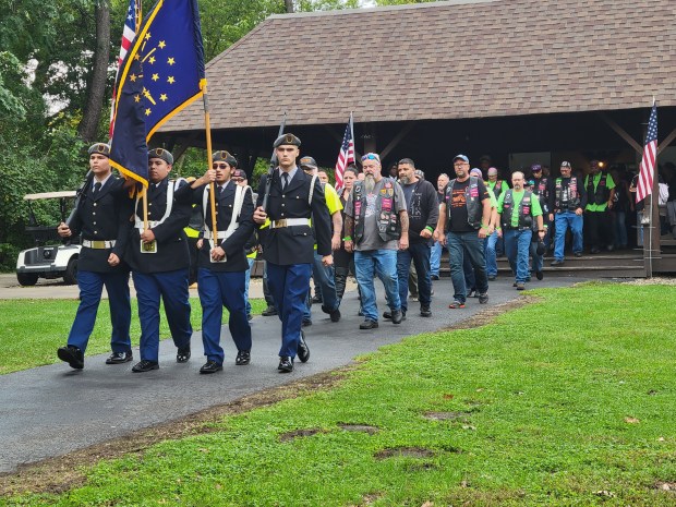 Hammond Central High School's Junior ROTC Color Guard -- from left, Edward Garcia Jr., Marco Aurelio Ocampo, Johnathon Meza and Andrew Fleming -- usher in American Veteran Motorcycle Riders Association members to kick off the 25th annual Victory for Veterans motorcycle ride on Sunday, Sept. 29, 2024. More than 1,350 riders came out to enjoy the day. (Michelle L. Quinn/for Post-Tribune)