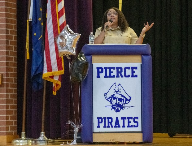 Seventh-grade teacher Miranda Barber speaks during the Youth Town Hall held at Clifford Pierce Middle School in Merrillville, Indiana Saturday Oct. 19, 2024. The event offered a unique opportunity for Pierce Students to engage with community leaders, parents and each other on issues affecting their future.(Andy Lavalley/for the Post-Tribune)