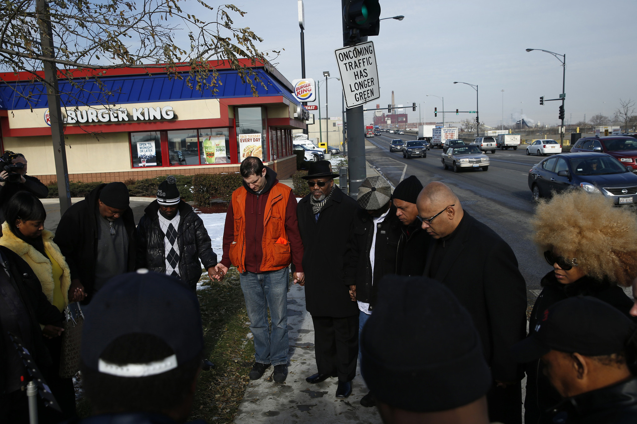 Community activists and residents gather to pay tribute to Laquan...