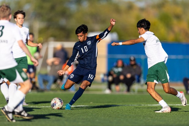 Reavis's Diego Ochoa (10) takes a shot on goal against Oak Lawn during a South Suburban Blue game in Burbank on Tuesday, Oct. 8, 2024. (Vincent D. Johnson / Daily Southtown)