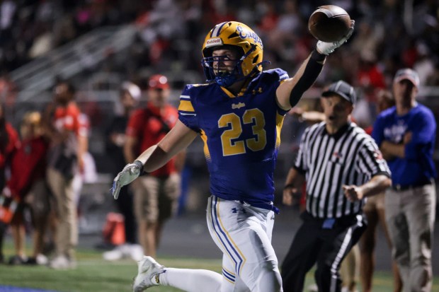 Sandburg's Quinn Dunkin (23) scores a touchdown against Homewood-Flossmoor during a non conference game in Orland Park on Friday, Sept. 13, 2024. (Troy Stolt / Daily Southtown)