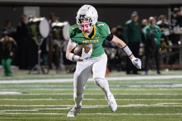 Providence's Jayden Mikulski (1) gets yards after the catch against Joliet Catholic during an ESCC game in New Lennox on Friday, Oct. 25, 2024. (Troy Stolt / for the Daily Southtown)