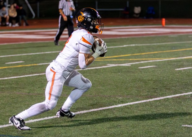 Lincoln-Way West's Ryan Stiglic (8) runs the ball during a game at Lockport Township High School in Lockport, IL, on Friday, Oct. 18, 2024. (Nate Swanson / for the Daily Southtown)