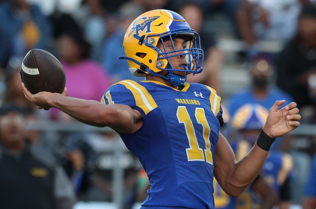 Crete-Monee quarterback Darrin Couch (11) throws against Richards during a football game in Crete on Friday, Aug. 30, 2024. (John Smierciak/ Daily Southtown)