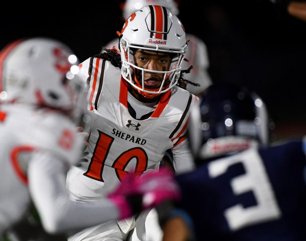 Shepard's quarterback Noah Vaughn (10) looks for an opening as he runs the ball. Shepard blanked Reavis 57-0 in a South Suburban Red Conference football matchup, in Burbank, Oct. 17, 2024. (Rob Dicker / for the Daily Southtown)