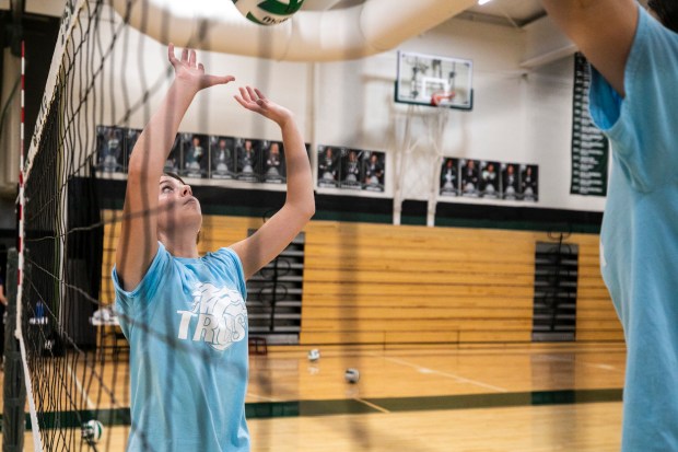 Evergreen Park's Neve Hayes works on her setting skills during a practice in Evergreen Park on Monday, Sept. 30, 2024. (Vincent D. Johnson / Daily Southtown)