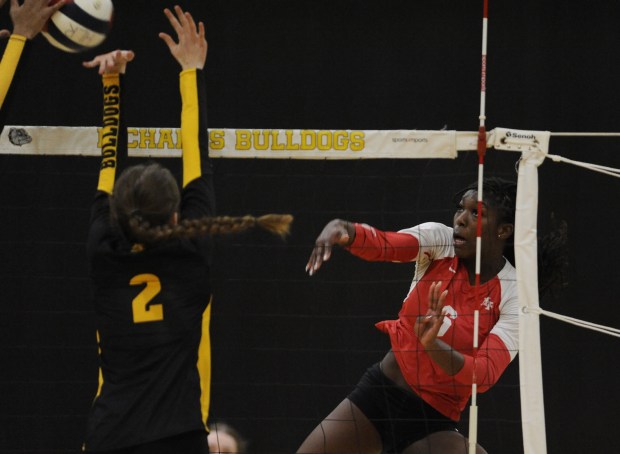 Homewood-Flossmoor's LaDonna Trantham (6) sends the ball past Richards' Katie Hedderman (2) during a nonconference match Tuesday, Oct. 15, 2024 in Oak Lawn, IL. (Steve Johnston/for the Daily Southtown)