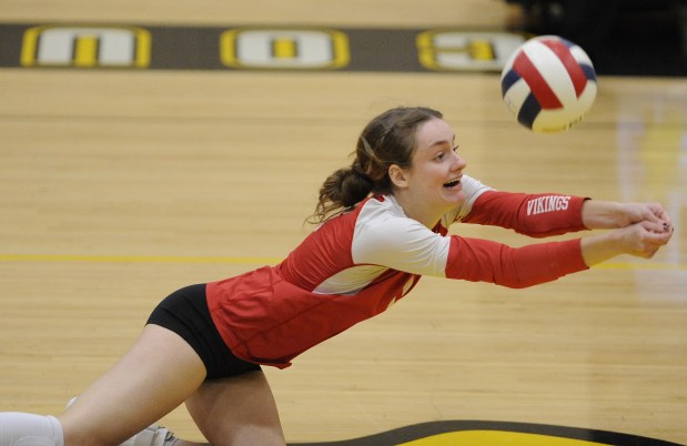 Homewood-Flossmoor's Frances Smith (11) dives to save the ball against Richards during a nonconference match Tuesday, Oct. 15, 2024 in Oak Lawn, IL. (Steve Johnston/for the Daily Southtown)