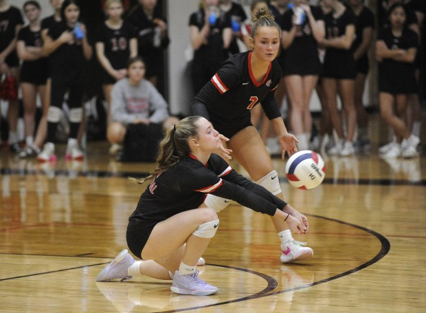 Lincoln-Way Central's Callie Jukovich (6) returns the ball alongside Penny Smith (7) during a nonconference match against Richards Thursday, Oct. 24, 2024 in New Lenox, IL. (Steve Johnston/for the Daily Southtown)