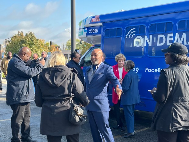 Phoenix Mayor Terry Wells talks to guests Oct. 25, 2024, after the ribbon-cutting ceremony in Lansing for the Pace On Demand bus service. (Samantha Moilanen/Daily Southtown)