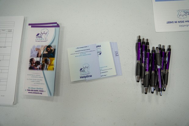 Pamphlets provided by the Crisis Center for South Suburbia sit on a table during a training session at the Stepney Institute of Esthetics & Wellness in Homewood. Under Illinois law, the initial renewal of a cosmetologist's, esthetician's, nail technician's, or hair braider's license requires one hour of domestic violence and sexual assault awareness education. (Addison Annis/Chicago Tribune)