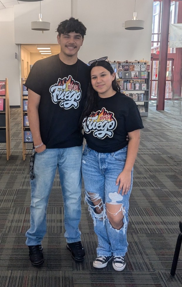 Christian Barrere and Genesis Suarez, who were part of the performance Oct. 12, 2024, joined the Fuego Dance Group to be together but then found they loved the moves. (Janice Neumann/for the Daily Southtown)