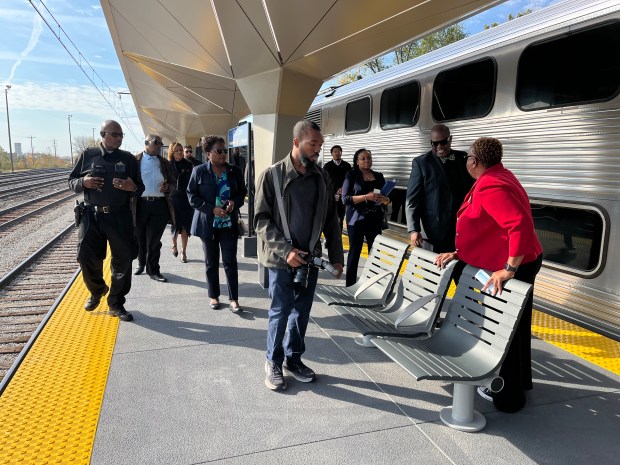 Harvey Mayor Christopher Clark and other officials receive a tour Oct. 29, 2024, from Metra Chief of Staff Janice Thomas of the newly renovated Metra Electric station on 147th Street/Sibley Boulevard. (Samantha Moilanen/Daily Southtown)