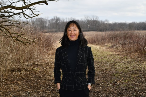 Tara Neff, executive director of the Nature Foundation of Will County, stands at Sugar Creek Preserve in Joliet earlier this year. (Forest Preserve District of Will County)