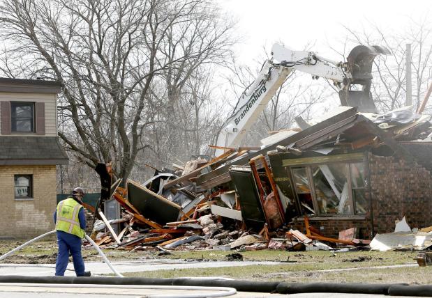 Crew members begin the April 2018 demolition of the West Calumet Housing Complex in East Chicago, which was contaminated with lead and arsenic from an existing U.S.S. Lead Superfund site. (Suzanne Tennant/Post-Tribune)