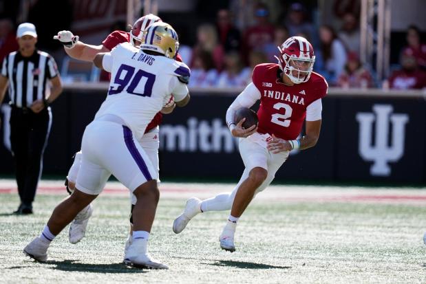 Indiana quarterback Tayven Jackson (2) runs during the first half of an NCAA college football game against the Washington, Saturday, Oct. 26, 2024, in Bloomington, Ind. (AP Photo/Darron Cummings)