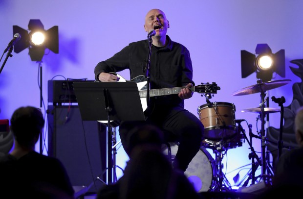 Musician Billy Corgan performs at his Madame Zuzu's teashop in Highland Park on Wednesday, July 27, 2022, during a virtual concert to benefit the victims of the mass shooting that occurred during the 4th of July parade in the North suburb. (Chris Sweda/Chicago Tribune)