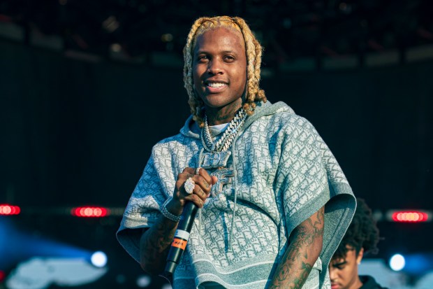 Lil Durk performs at Lyrical Lemonade Summer Smash at Douglass Park on Aug. 22, 2021. Lil Durk wore a pendent dedicated to fellow rapper King Von, who was killed in 2020. (Vashon Jordan Jr./Chicago Tribune)