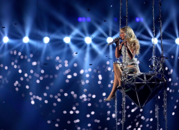 Sabrina Carpenter performs "Please Please Please" during the MTV Video Music Awards on Sept. 11, 2024, at UBS Arena in Elmont, N.Y. (Charles Sykes/Invision/AP)