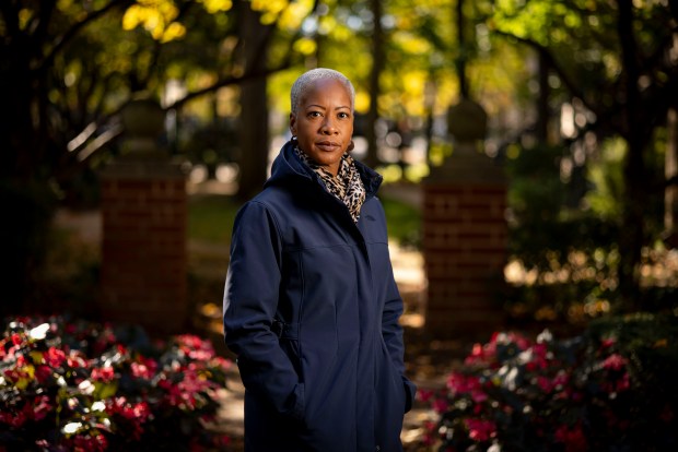 Michelle Brumfield, a former Lincoln Park High School assistant principal, stands in the South Loop on Oct. 16, 2024. (Brian Cassella/Chicago Tribune)