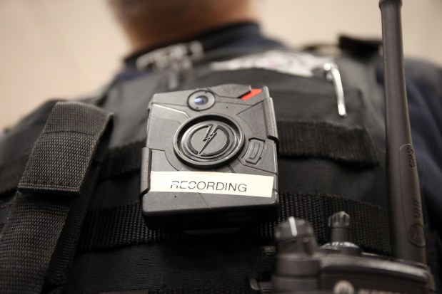 The Chicago Police Department officials hold a demonstration on how its officers are using body cameras on Feb. 13, 2015. (Zbigniew Bzdak/Chicago Tribune)