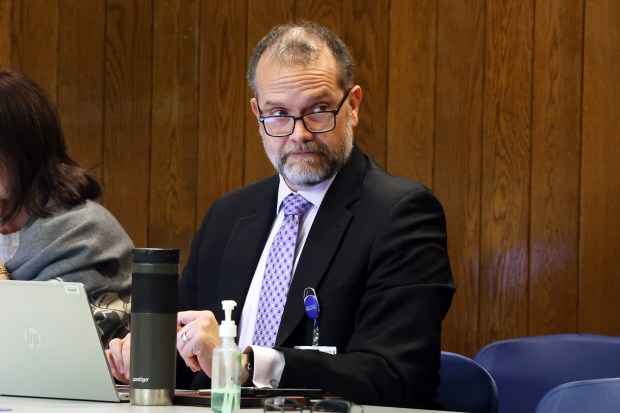 Newly confirmed CEO for the Cook County Health system, Dr. Erik Mikaitis, at a meeting of the Cook County Board of Commissioners on Oct. 24, 2024. (Terrence Antonio James/Chicago Tribune)