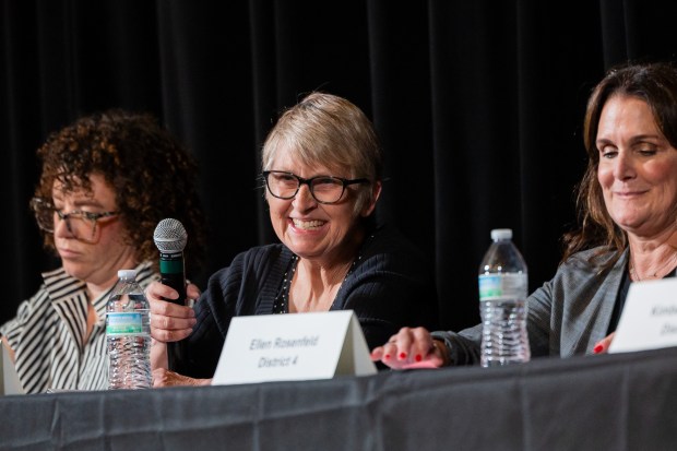 Karen Zaccor, candidate for Chicago Board of Education in District 4, center, speaks during a school board candidate forum on Oct. 5, 2024. (Tess Crowley/Chicago Tribune)