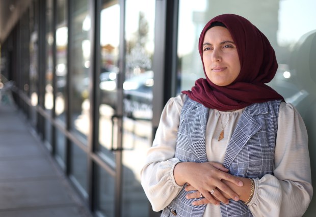 Fidaa Elaydi, an immigration attorney, stands outside of her law office on Oct. 1, 2024, in Worth. Elaydi has been practicing law for ten years. (Stacey Wescott/Chicago Tribune)