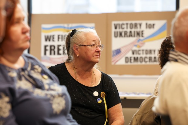 Maria Bluma, of Milwaukee, listens to a speaker during a nonpartisan voter education forum regarding support for Ukraine at Milwaukee Public Library in Milwaukee on Oct. 20, 2024. (Eileen T. Meslar/Chicago Tribune)