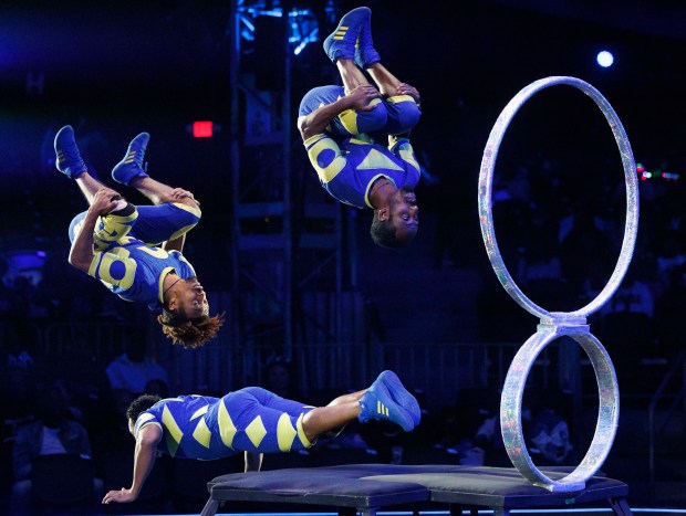 Acrobats flip at a UniverSoul Circus performance in Washington Park, Oct. 2, 2024. (Armando L. Sanchez/Chicago Tribune)