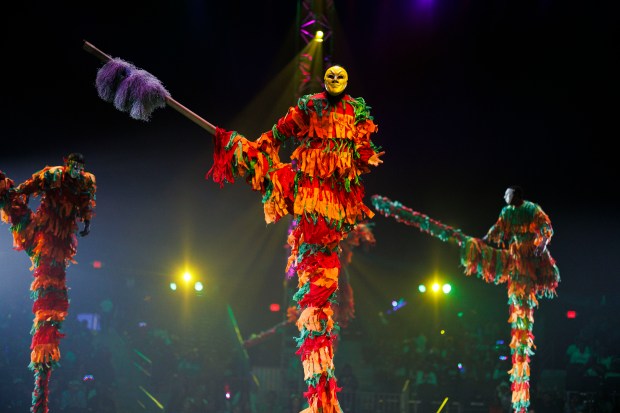 UniverSoul Circus members on stilts perform in Washington Park, Oct. 2, 2024. (Armando L. Sanchez/Chicago Tribune)