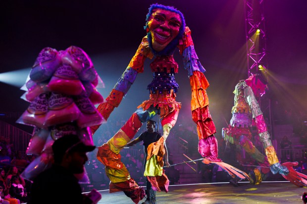 A giant puppet performs in a tent at UniverSoul Circus in Washington Park, Oct. 2, 2024. (Armando L. Sanchez/Chicago Tribune)