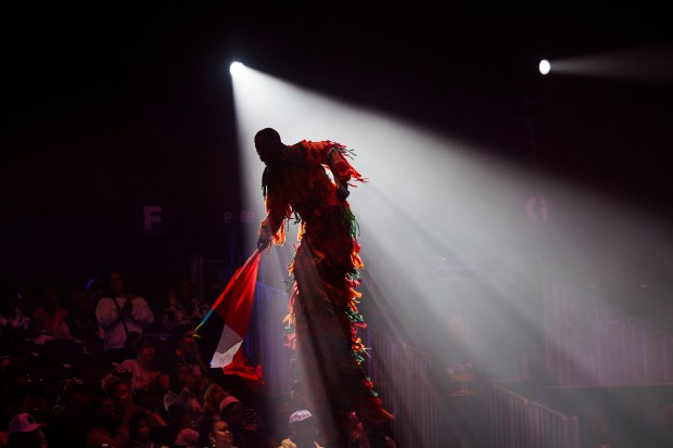 A man on stilts performs at UniverSoul Circus in Washington Park. (Armando L. Sanchez/Chicago Tribune)