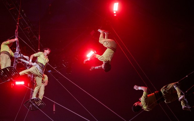 Trapeze performers fly at UniverSoul Circus in Washington Park, Oct. 2, 2024, in Chicago. (Armando L. Sanchez/Chicago Tribune)