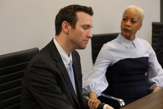 Former Lincoln Park High School interim principal John Thuet, left, and former assistant principal Michelle Brumfield discuss their abrupt termination from Lincoln Park High School on Feb. 25, 2020. Thuet became emotional when asked what he had told his child about his termination. (Antonio Perez/ Chicago Tribune)