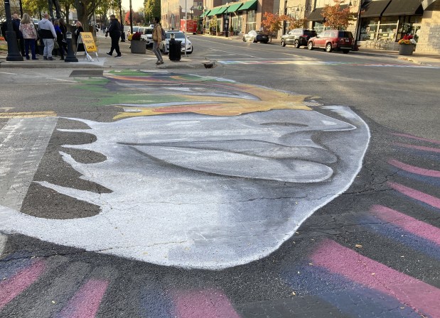 This crosswalk mural will soon be complete. (Steve Sadin/For the Lake County News-Sun)