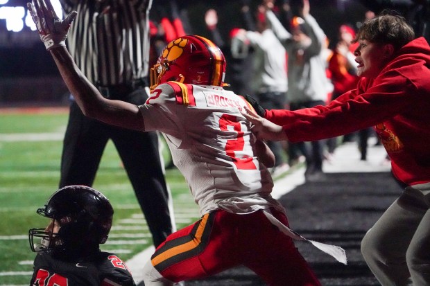 Batavia's Isaiah Brown (2) reacts after scoring a touchdown against Lincoln-Way Central during a Class 7A state semifinal football game at Lincoln-Way Central High School on Saturday, Nov 23, 2024. (Sean King / for The Beacon-News)