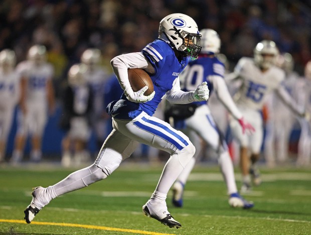 Geneva's Talyn Taylor (1) returns a third quarter kick off for a TD against Burlington Central during a Class 6A second-round game Saturday, Oct. 9, 2024 in Geneva. (H. Rick Bamman / The Beacon-News)