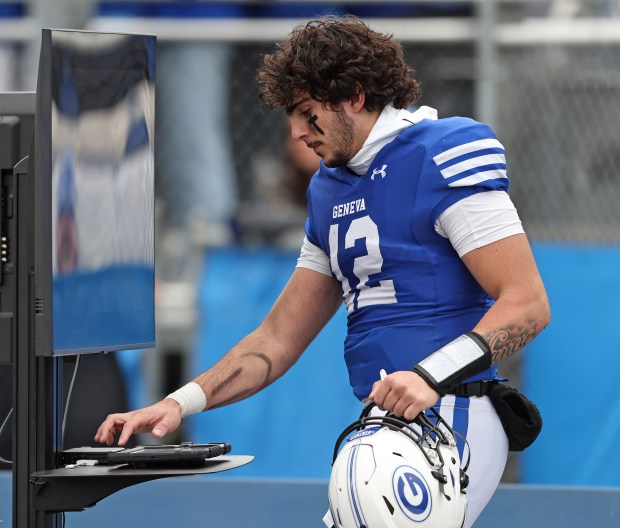 Geneva's Anthony Chahino (12) watches a replay on the sideline during a Class 6A state semifinal game against Cary-Grove Saturday, Nov. 23, 2024 in Geneva. (H. Rick Bamman / The Beacon-News)