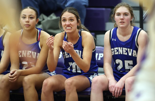 Geneva's Peri Sweeney (10) reacts to a call in the third quarter between teammates Adelaide Evans (21) left and Bridget Hecker (25) during a Doreen Zierer Tournament game against Hampshire in Hampshire on Friday, Nov. 22, 2024.(H. Rick Bamman/for the Beacon-News)