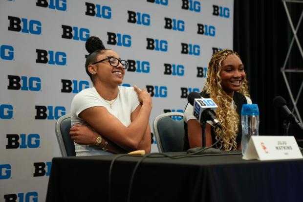 USC's Kiki Iriafen, right, and JuJu Watkins speak during Big Ten media day Oct. 2, 2024, in Rosemont. (AP Photo/Erin Hooley)